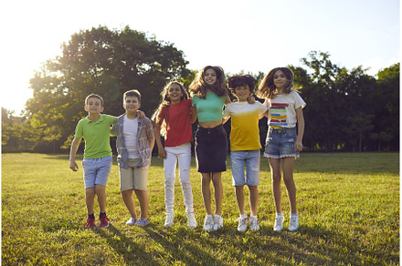 Group of happy children playing, a Person Photo by StudioRomantic