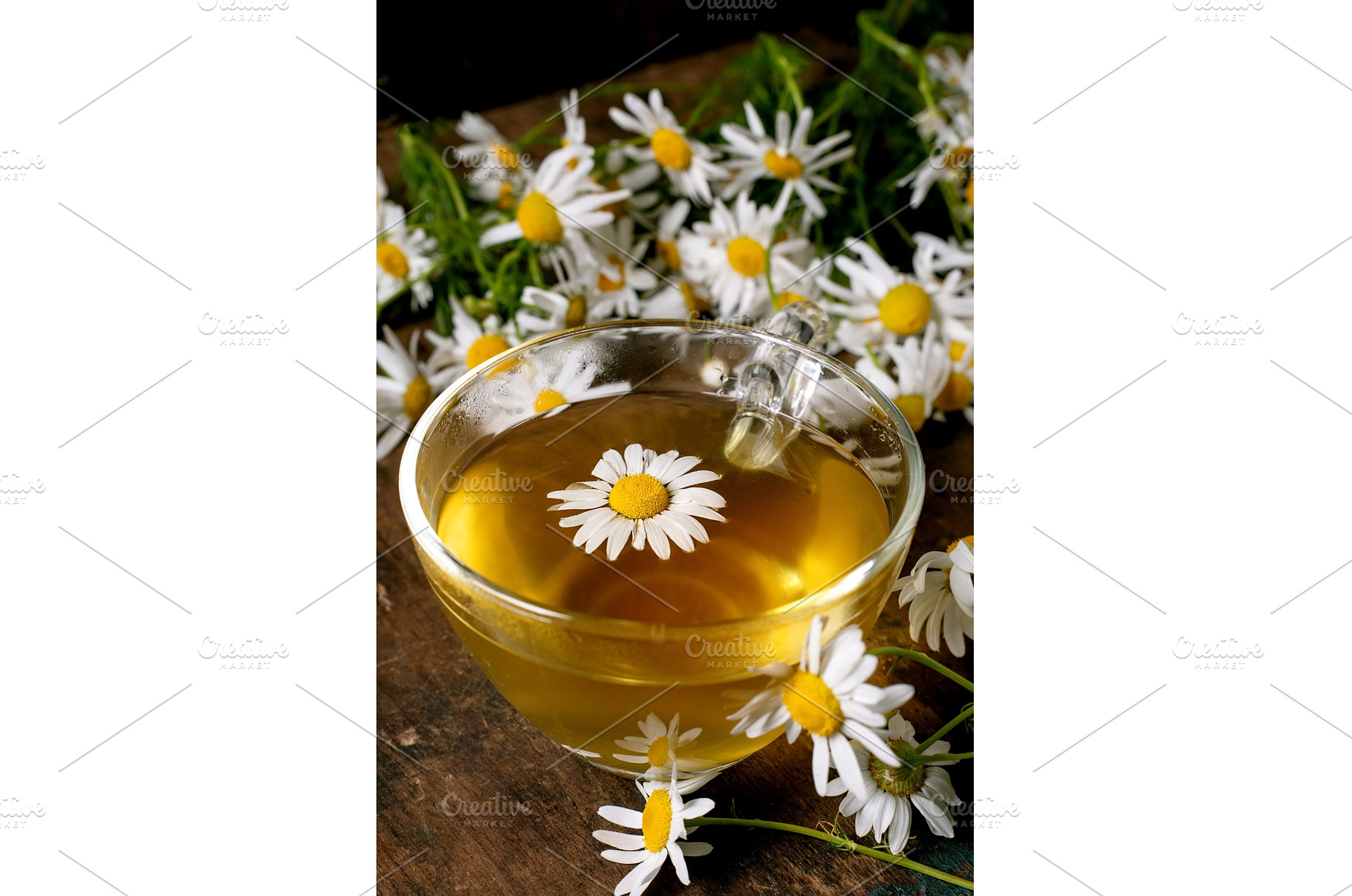 Chamomile Tea Cup with Fresh Daisies, a Food & Drink Photo by Natasha Breen