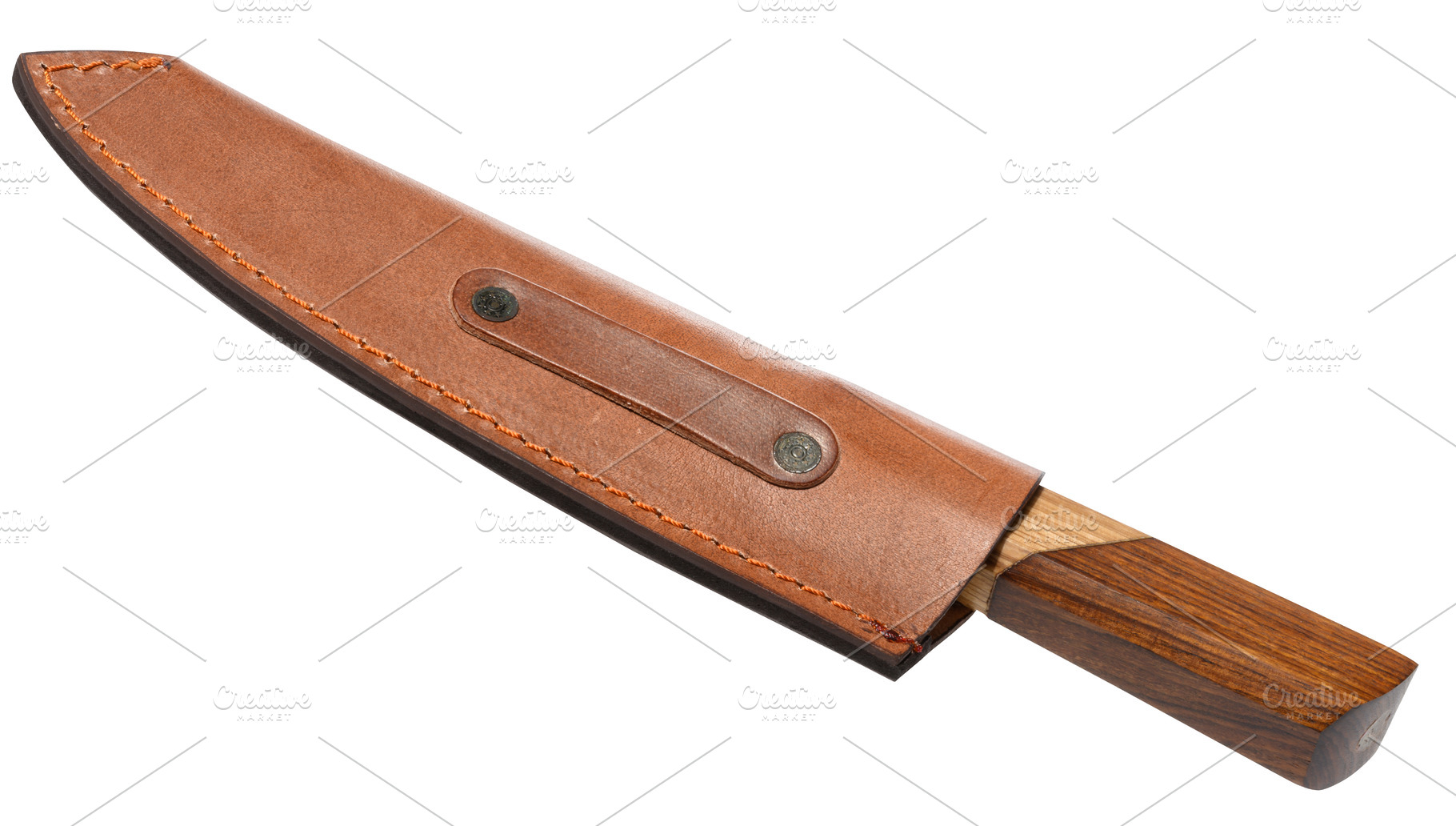 Knife with a wooden handle is inserted into a brown leather case, an Abstract Photo by ndanko