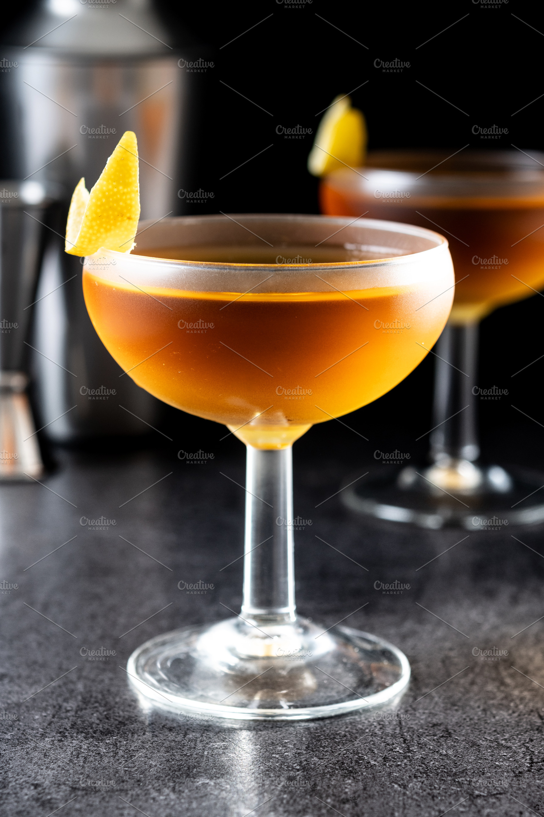 Paper plane cocktail on black slate background, a Food & Drink Photo by etorres69