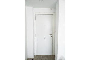 Modern white apartment entry door, an Architecture Photo by volodymyrshtun13795