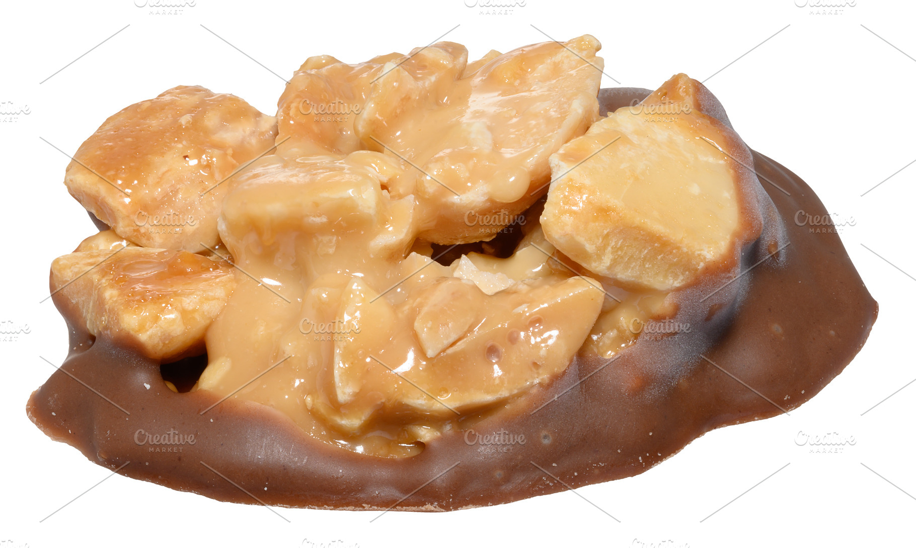 Traditional macadamia nut tartlet candy in caramel on a milk cho, a Food & Drink Photo by ndanko