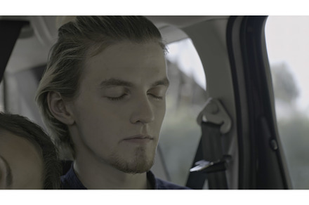 Young couple sleeps during car trip, a Person Photo by Media Whale Stock