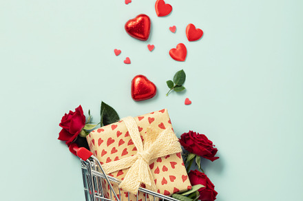 Valentine's day cncept. Shopping trolley with gift boxes, roses,, a Holiday Photo by Natalia Klenova's Shop