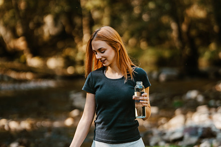 Woman enjoying in nature, a Person Photo by REDDOT Studio