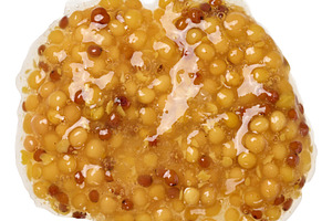 A pile of mustard with seeds on isolated background, top view, a Food & Drink Photo by ndanko