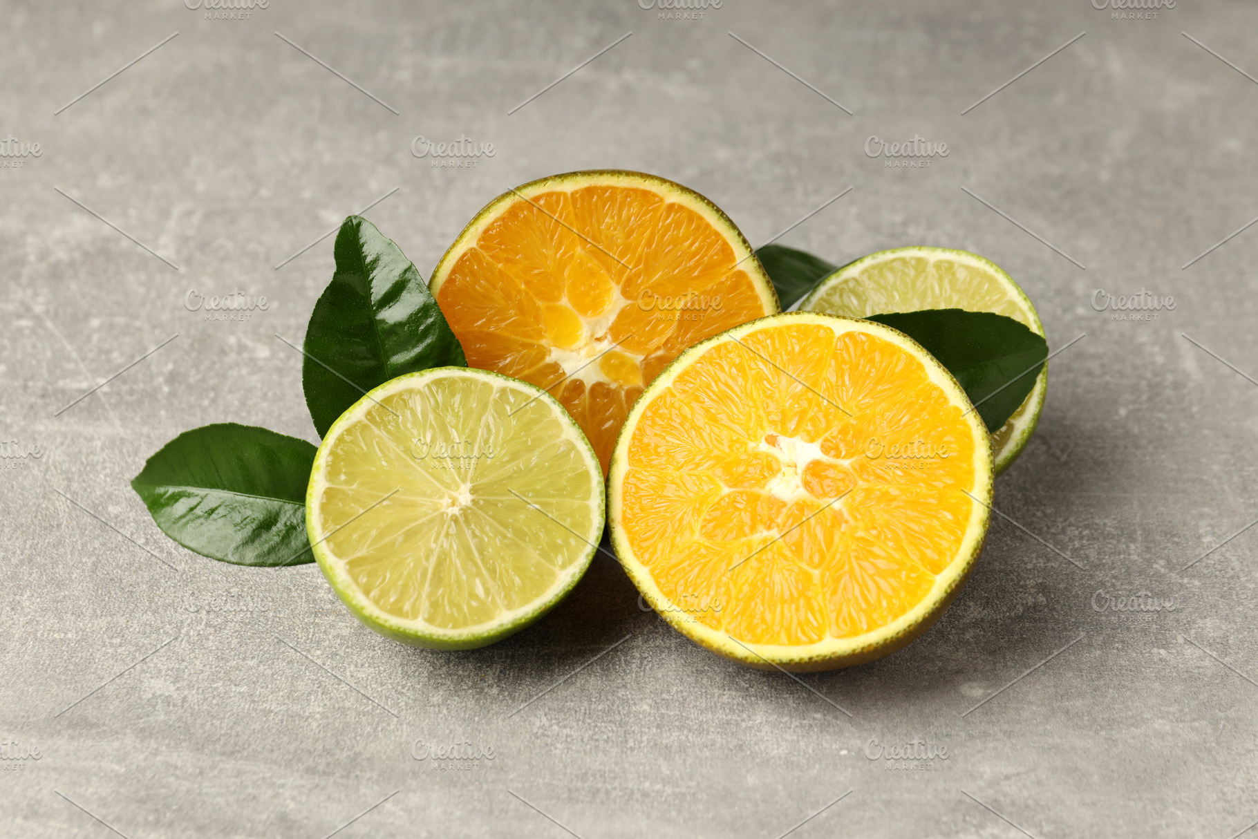 Concept of tasty food with citrus fruits on gray textured backgr, a Food & Drink Photo by AtlasStudio PRO