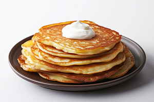Potato pancakes with sour cream, a Food & Drink Photo by MistyDay