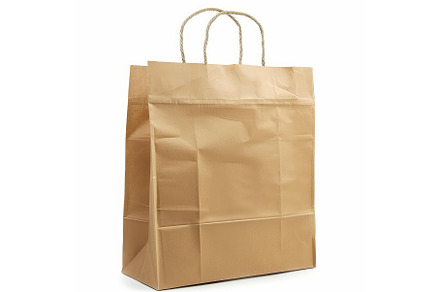 Brown paper shopping bag standing on, a Background Photo by Ylivdesign