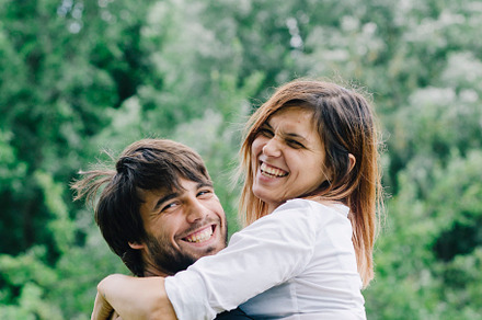 Happy couple kissing and hugging in featuring couple, love, and hug, a Person Photo by hitdelight