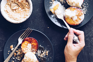 Grilled peaches and ice cream containing hand, woman, and female