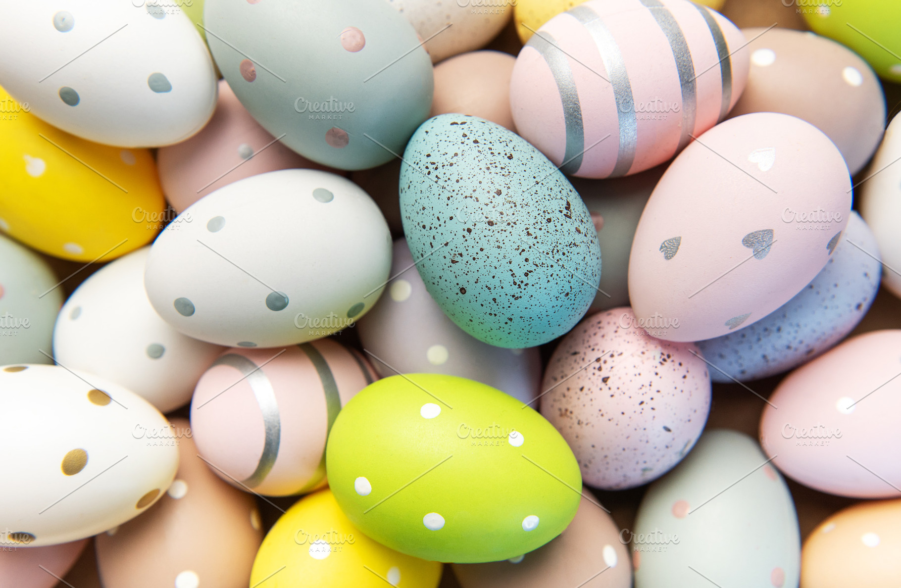 Colorful easter eggs with pastel patterns and dots background, a Holiday Photo by Olena Rudo