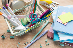 School stationery shopping basket with study supplies