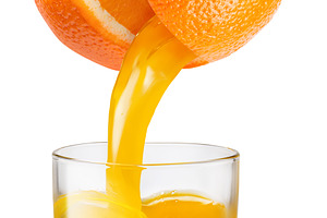 Glass of orange juice and fruit, a Food & Drink Photo by Volff
