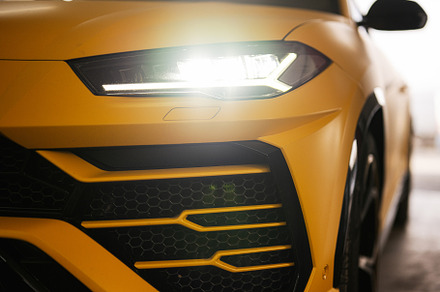 Headlights of yellow sport car suv., a Transportation Photo by AS photostudio