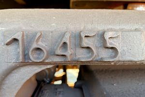 A close-up view of a metal surface with embossed numbers 16455, showcasing indu, an Industrial Photo by Textures & Backgrounds