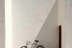 Old Bicycle Leaning Against Wall, an Architecture Photo by Virgo Studio