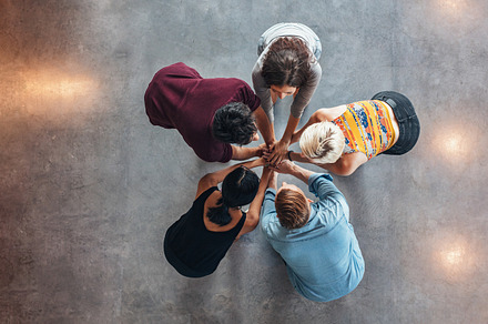 Young students celebrating success featuring above, celebration, and cheering, a School & Education Photo by Jacob Lund