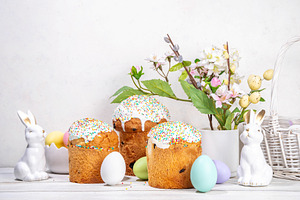 Easter cakes with, colorful, basket, ceramic rabbits and spring, a Holiday Photo by Rimma