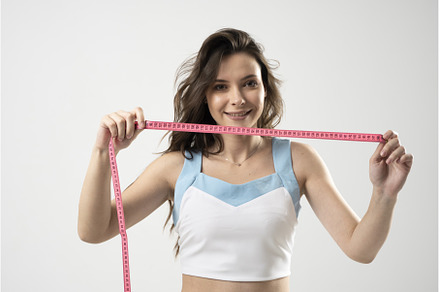 Young brunette fitness woman with, a Sports & Recreation Photo by volodymyrshtun13795