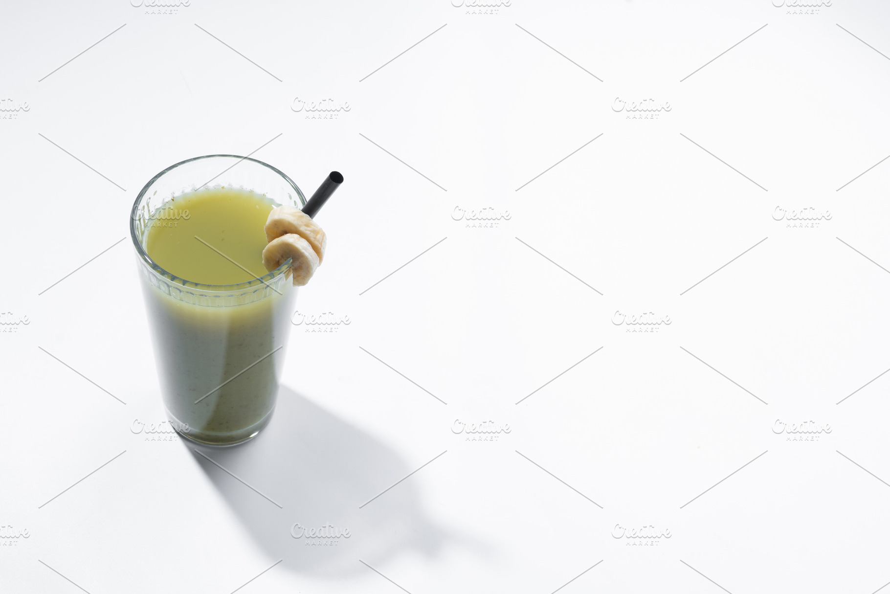 Green smoothie with spinach,banana, apple, and lemon, a Food & Drink Photo by etorres69