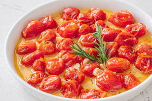 Roasted cherry tomatoes with garlic, a Food & Drink Photo by Alexander Prokopenko