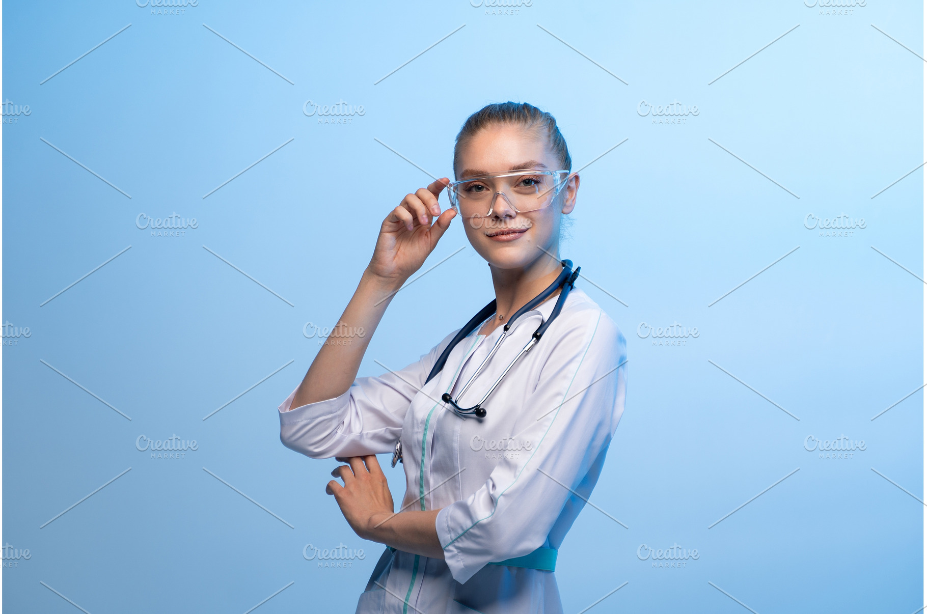 Young woman doctor wearing safety, a Health & Medical Photo by volodymyrshtun13795