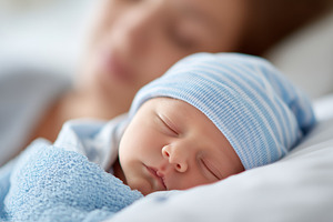 Peaceful sleeping newborn baby in a, a Health & Medical Photo by MistyDay