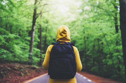 Tourist with a black backpack featuring hiker, tourism, and girl