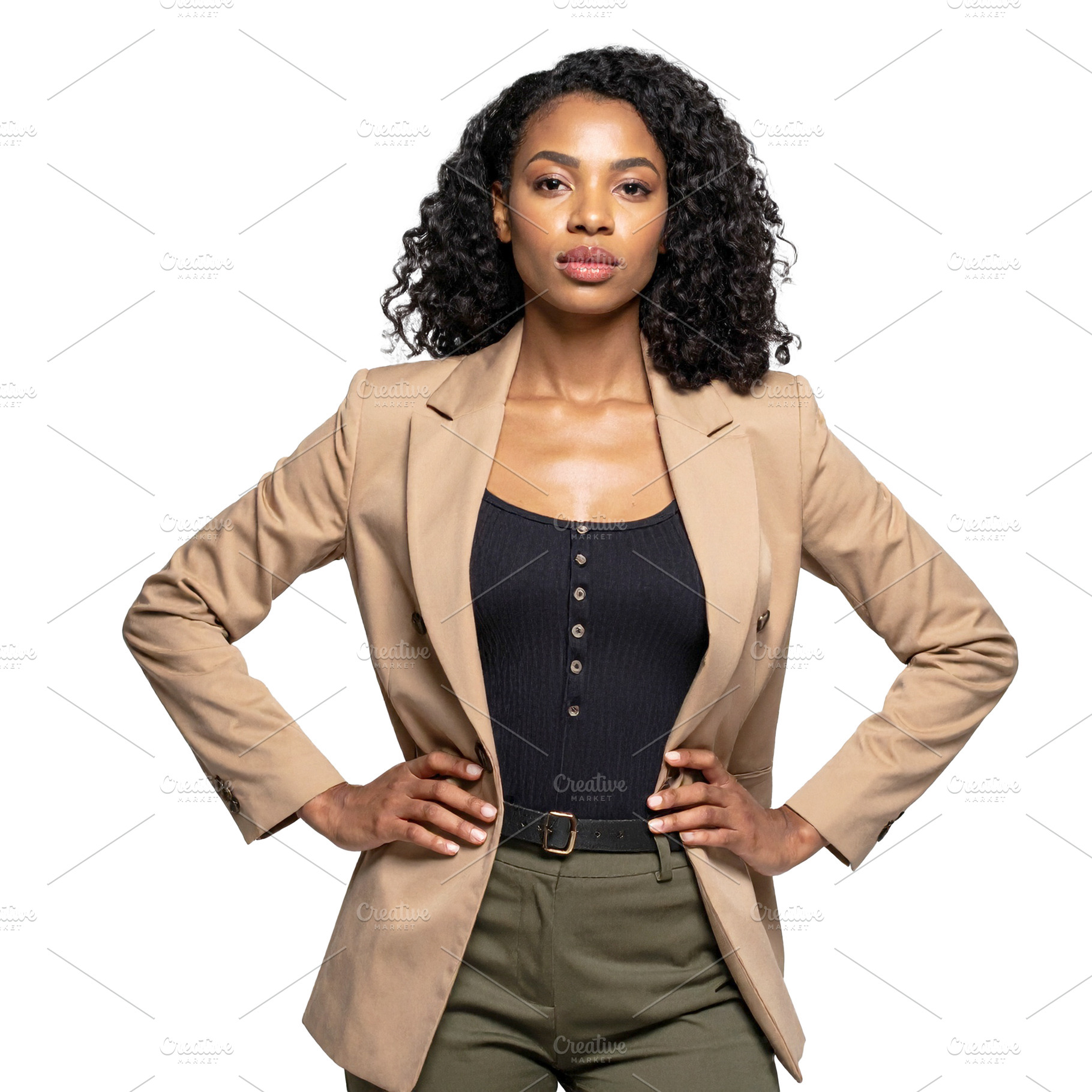 Black woman standing in front of a neutral backdrop wearing a bo, a Person Photo by DanFLCreativo