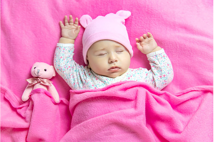 Baby sleeps with a bear. Selective, a Person Photo by yanadjana