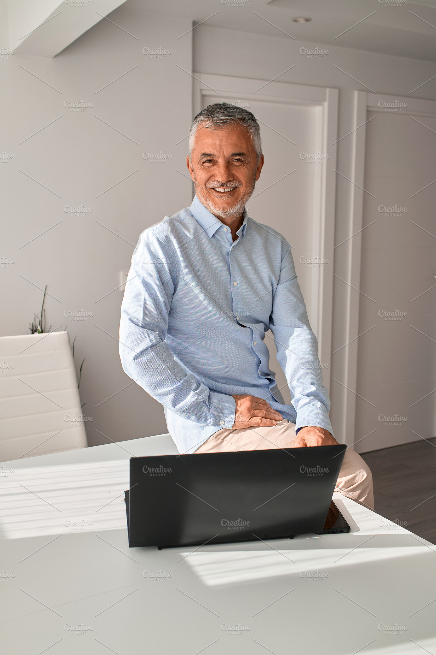 Portrait of happy and smiling busine, a Person Photo by alfernec