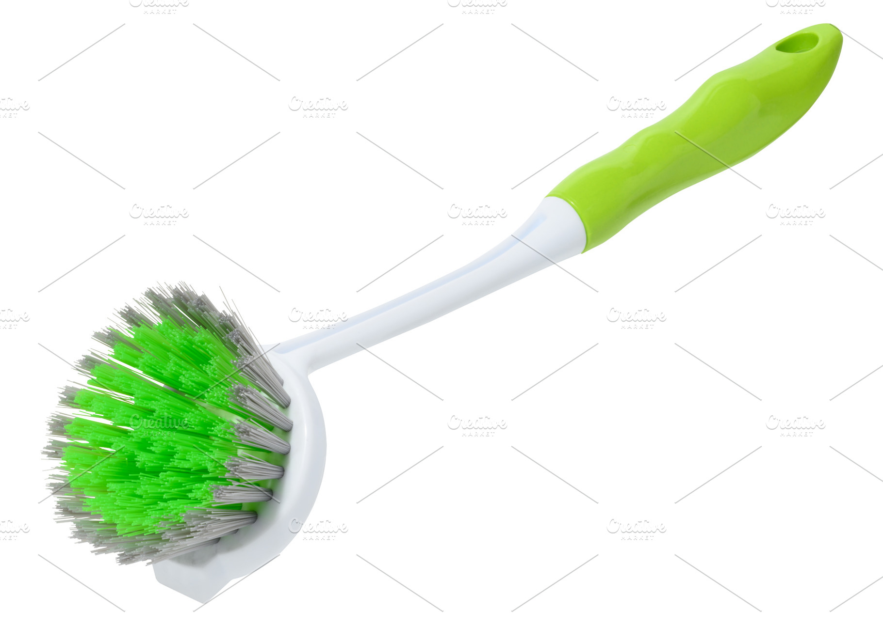 Green plastic brush for washing dishes or cleaning with long whi, an Abstract Photo by ndanko