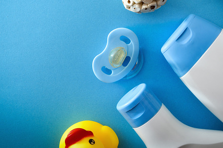 Detail of bath products on blue table for baby, a Health & Medical Photo by Davizro's Market