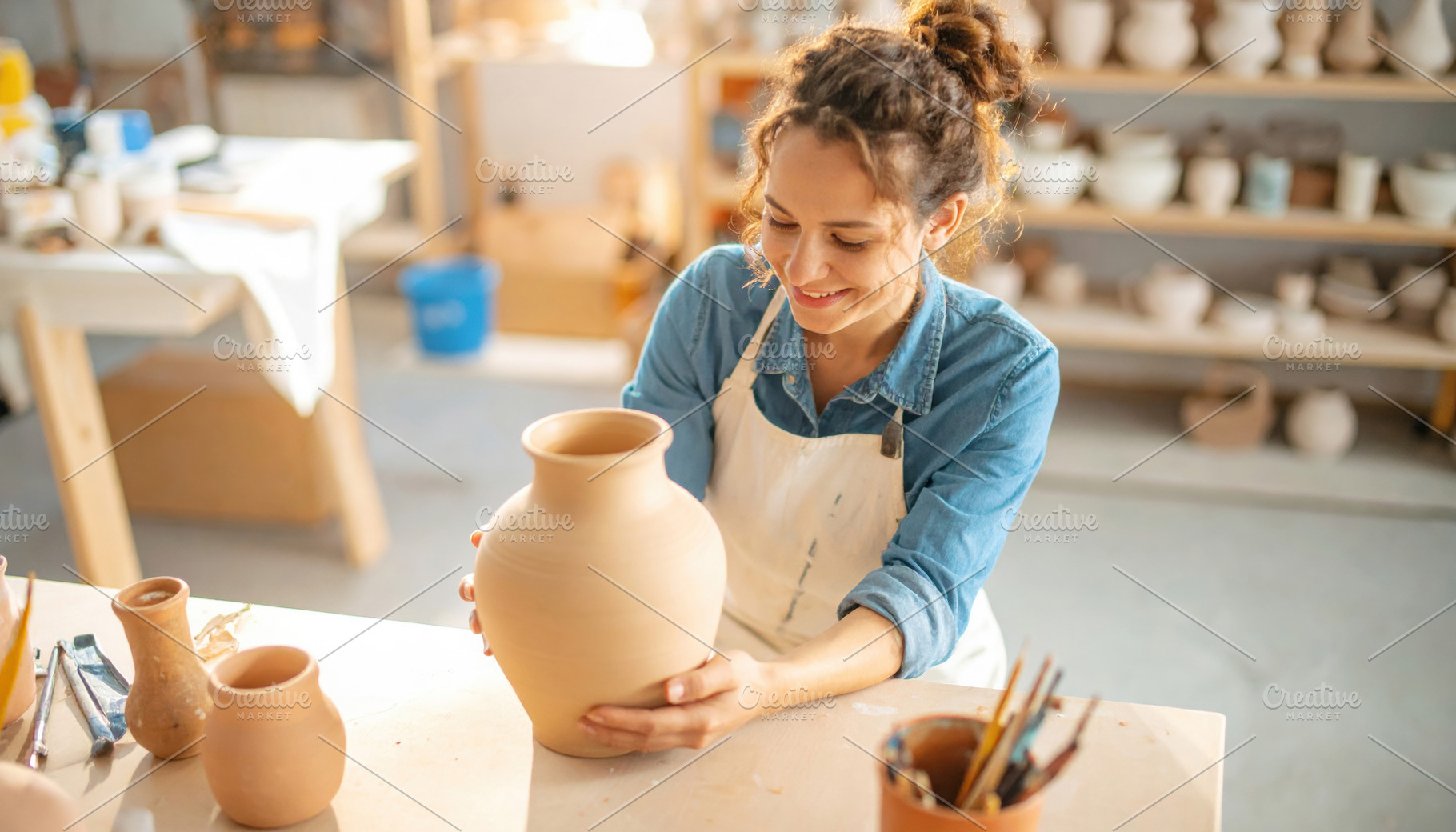 Young Female Potter Shaping Clay Vase, an Arts & Entertainment Photo by Davizro's Market