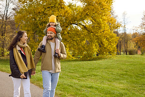 Family Walking Daughter on Shoulders, a Person Photo by StudioRomantic
