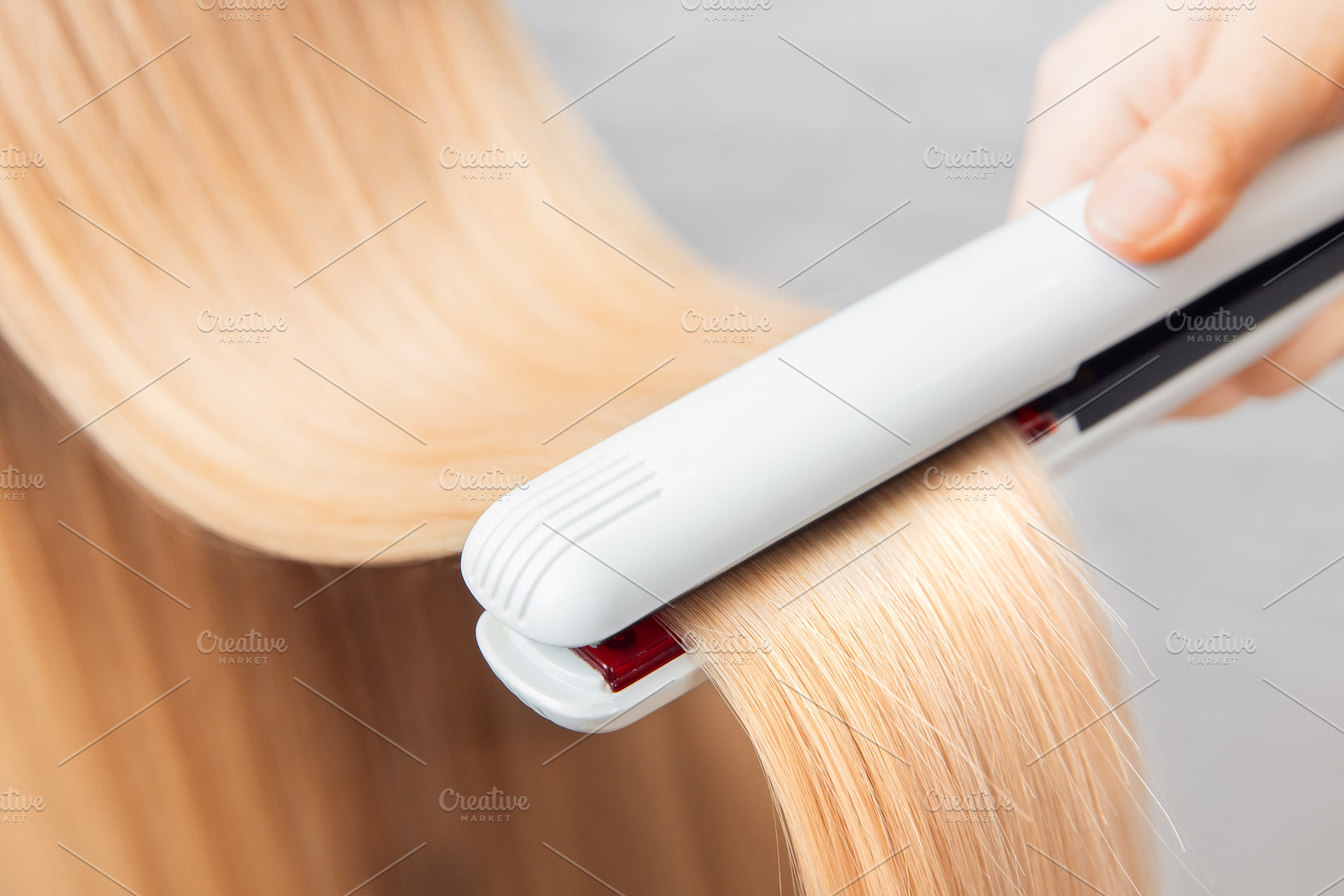 Hair iron straightening beauty treat, a Beauty & Fashion Photo by Parilov