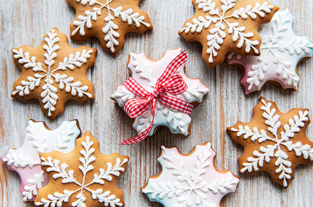 Christmas gingerbread cookies on white wooden background, a Holiday Photo by Olena Rudo