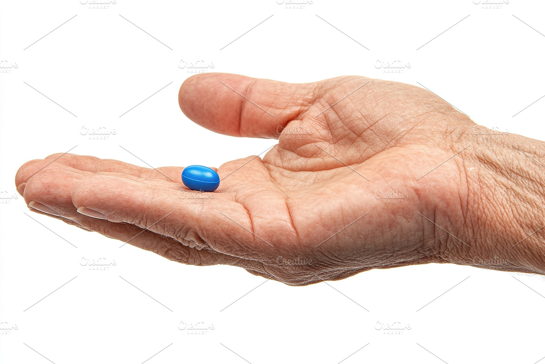 Mature hand with medicine pills, a Health & Medical Photo by AlyaAnd