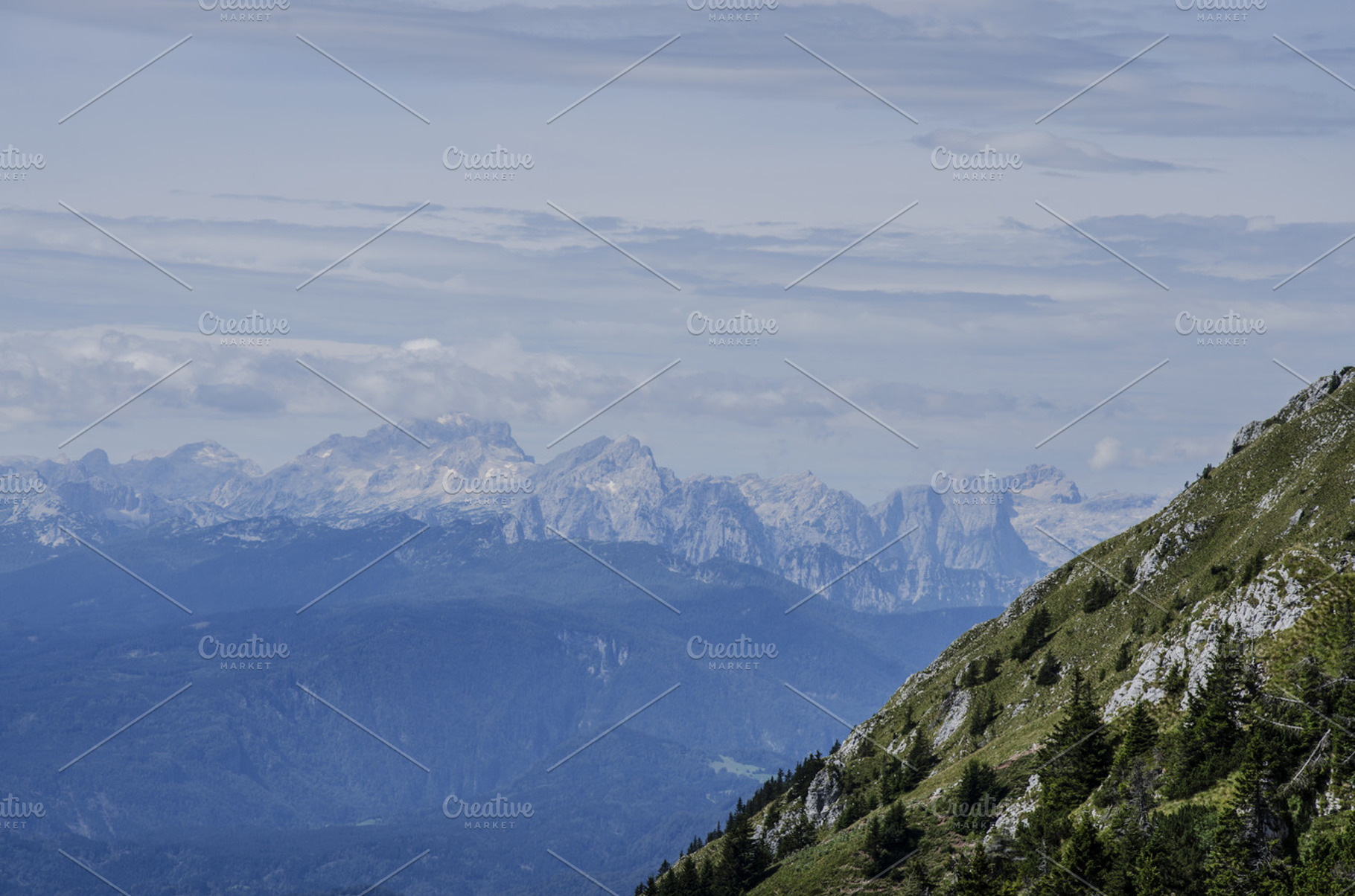 Cloudy Mountains Stock Photo Containing Green And Grass