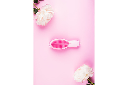 Pink hair brush in white peonies containing hair, brush, and tangle, a Beauty & Fashion Photo by Lifemorning