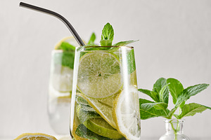 Summer drink with lime and mint. Cold drink, non-alcoholic mojit, a Food & Drink Photo by ndanko