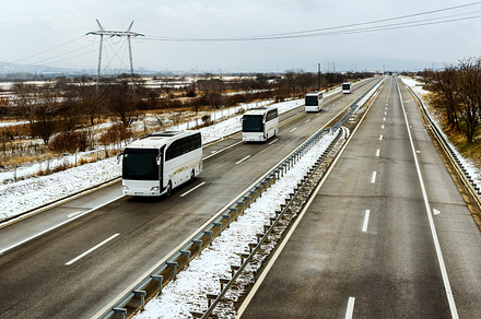 Buses transport in a snowy landscape, a Background Photo by wr7 Media