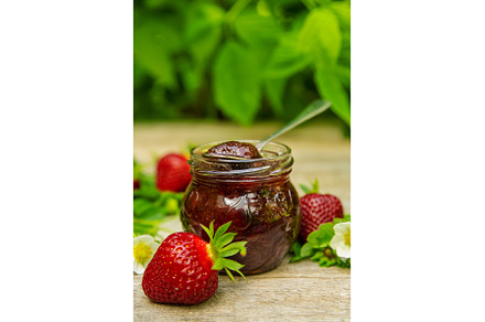 Homemade strawberry jam in a jar, a Food & Drink Photo by yanadjana