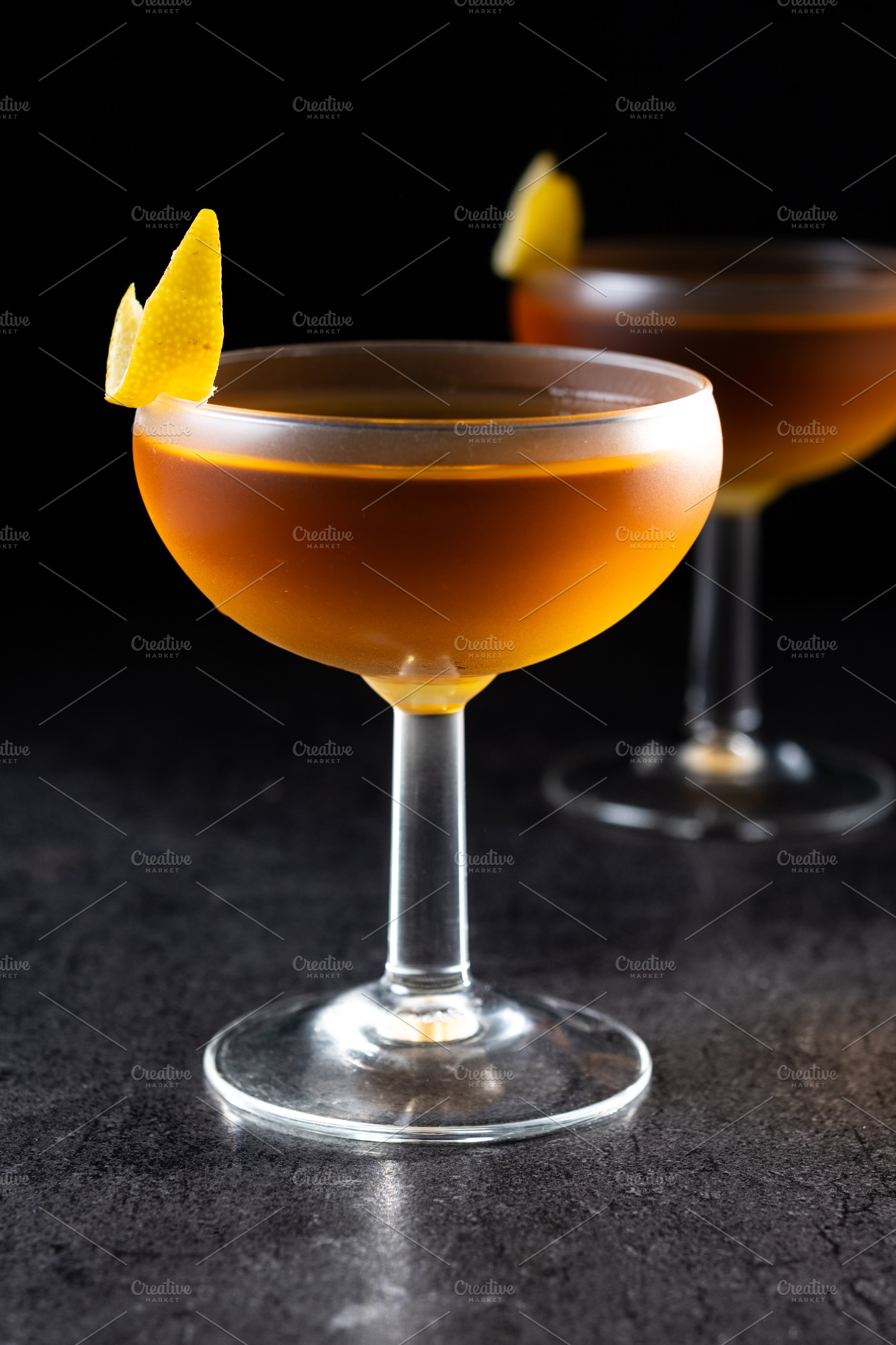 Paper plane cocktail on black slate background, a Food & Drink Photo by etorres69