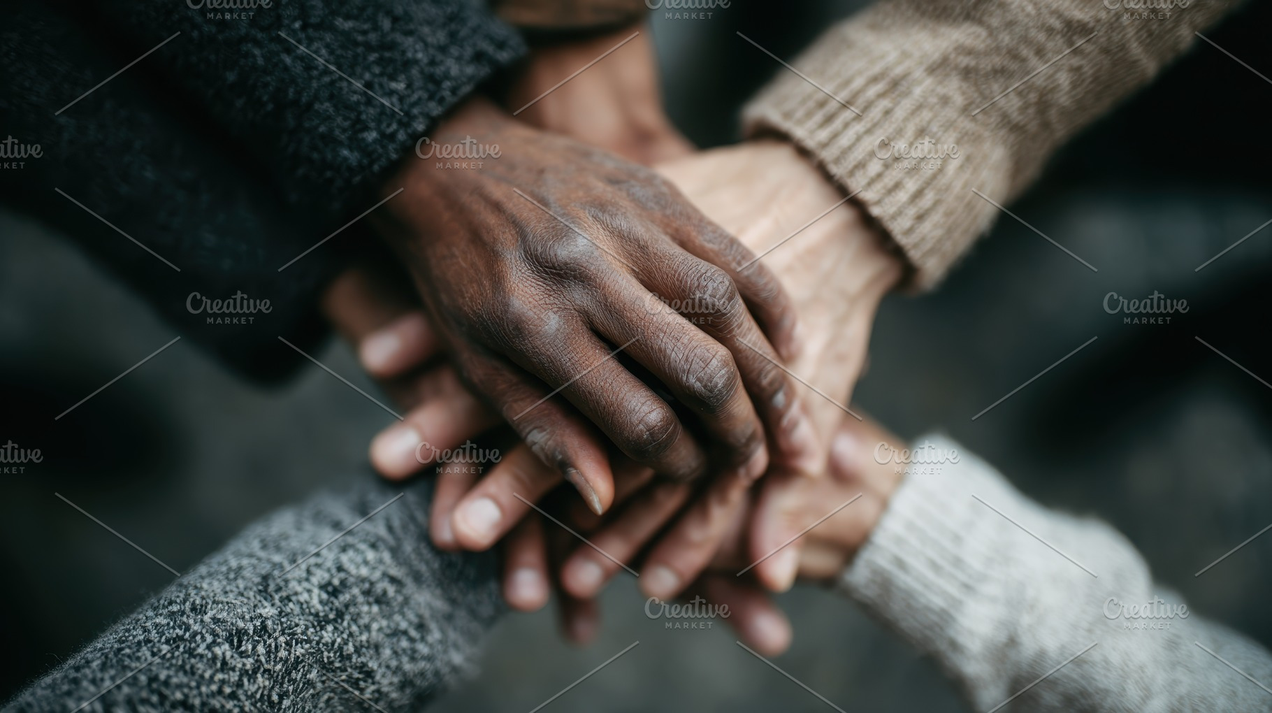 Diverse hands clasped together unity, a Photo by Pixeness Studio
