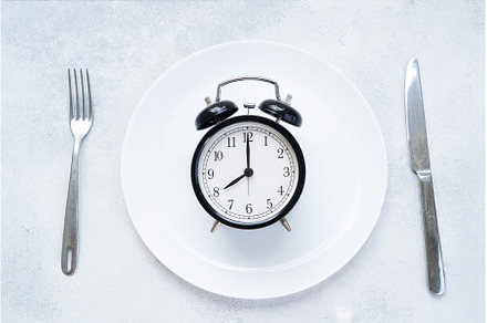 Intermitted farsting diet concept, a Food & Drink Photo by Neirfy