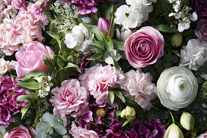 Floral background with pink and purple roses, tulips, and ranunc, a Photo by Studio ANNA