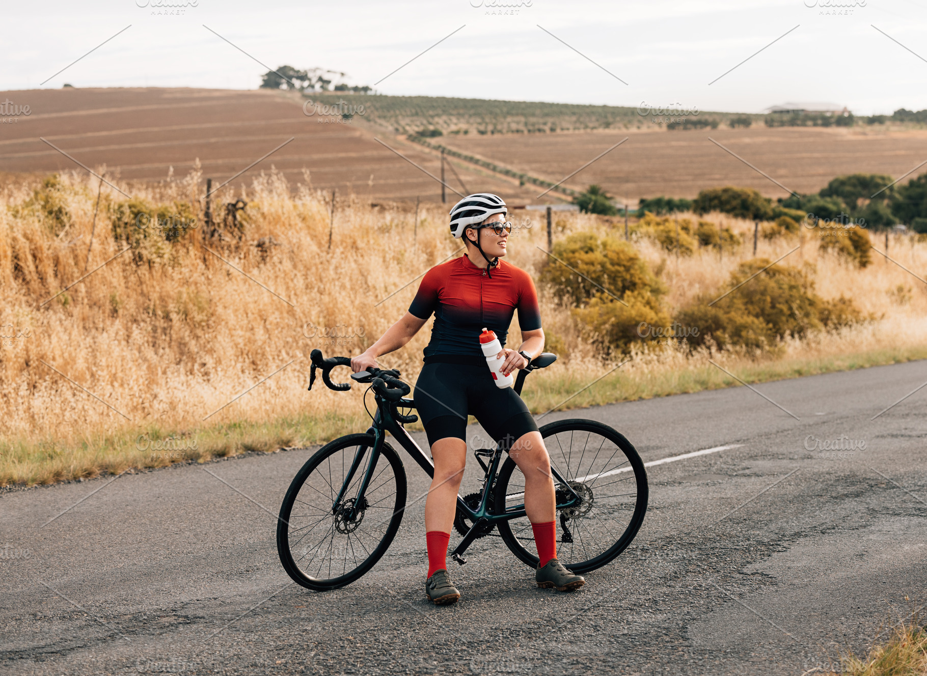 Young woman cyclist sitting, a Person Photo by Artem Varnitsin