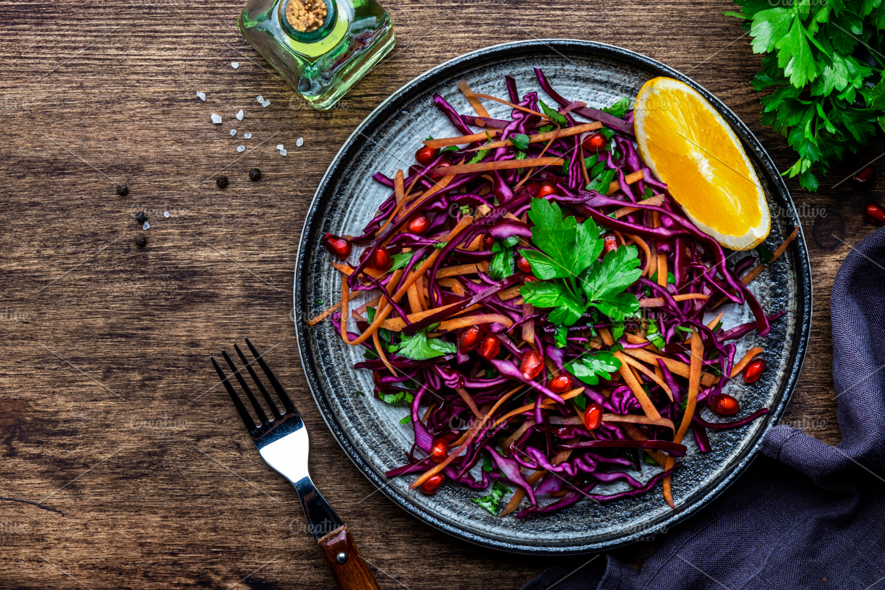 Coleslaw red cabbage salad with carrot, parsley, pomegranate and, a Food & Drink Photo by 5PH
